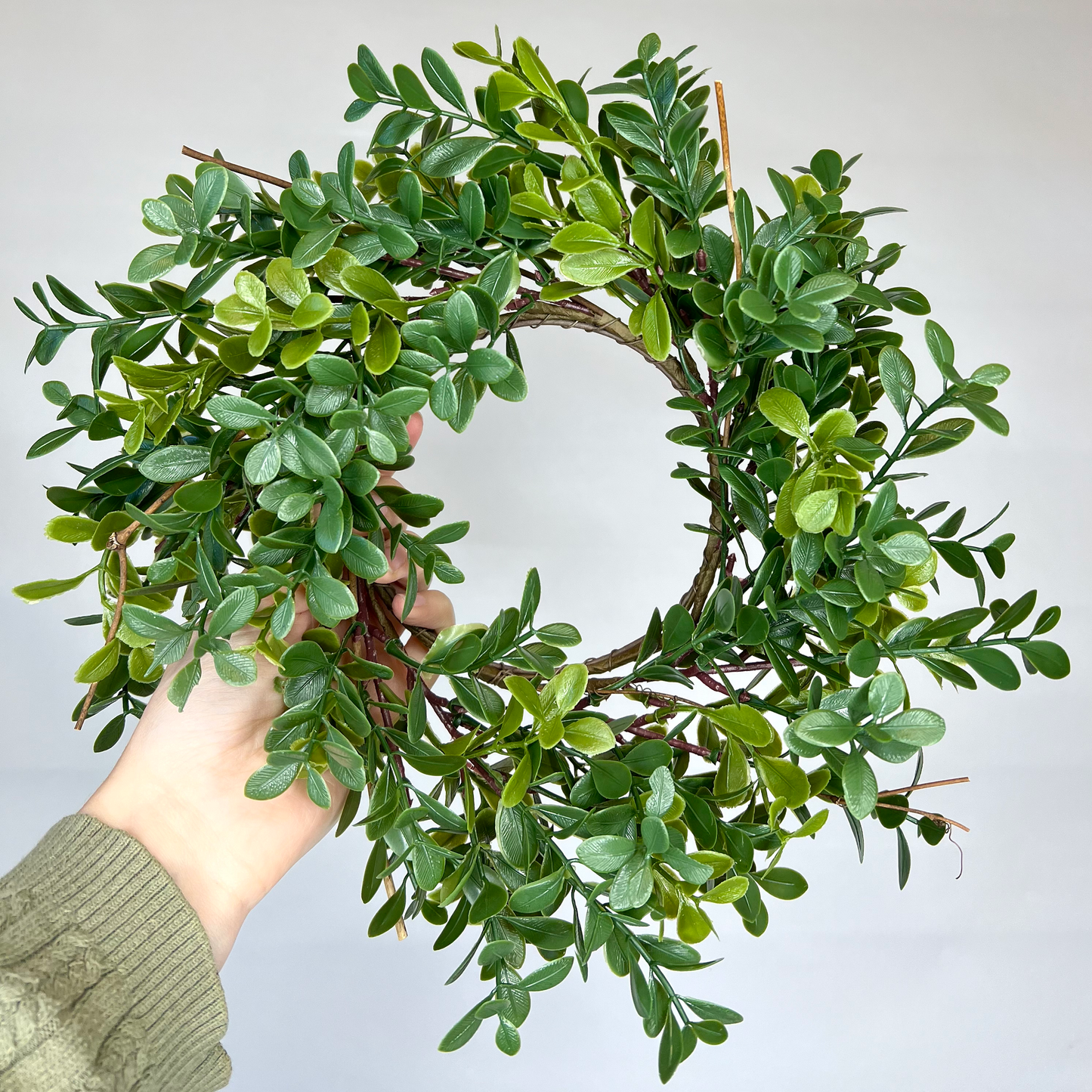 Boxwood wreath or candle ring centerpiece