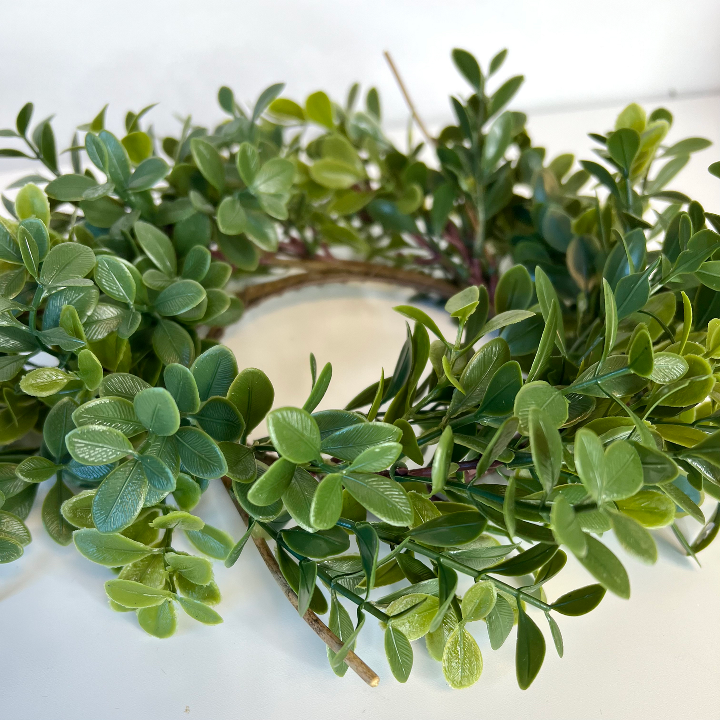 Boxwood wreath or candle ring centerpiece